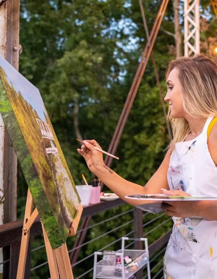 Yelena Divinity painting outdoors